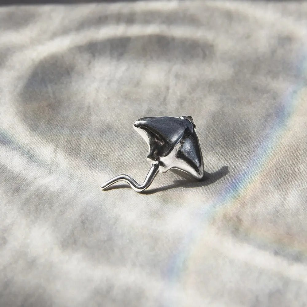 Earcuff Raya águila moteada